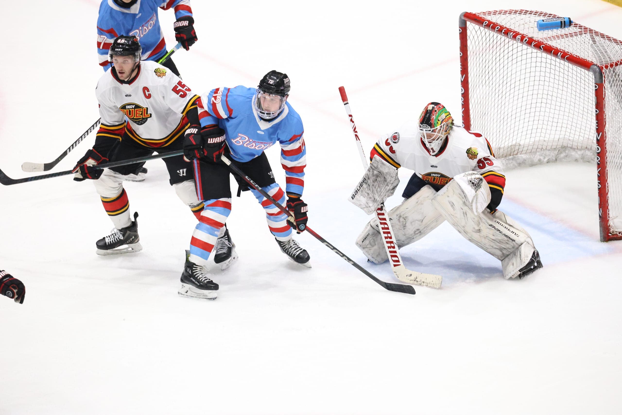Cam Gray reading a shot through a screen in an Indy Fuel game.