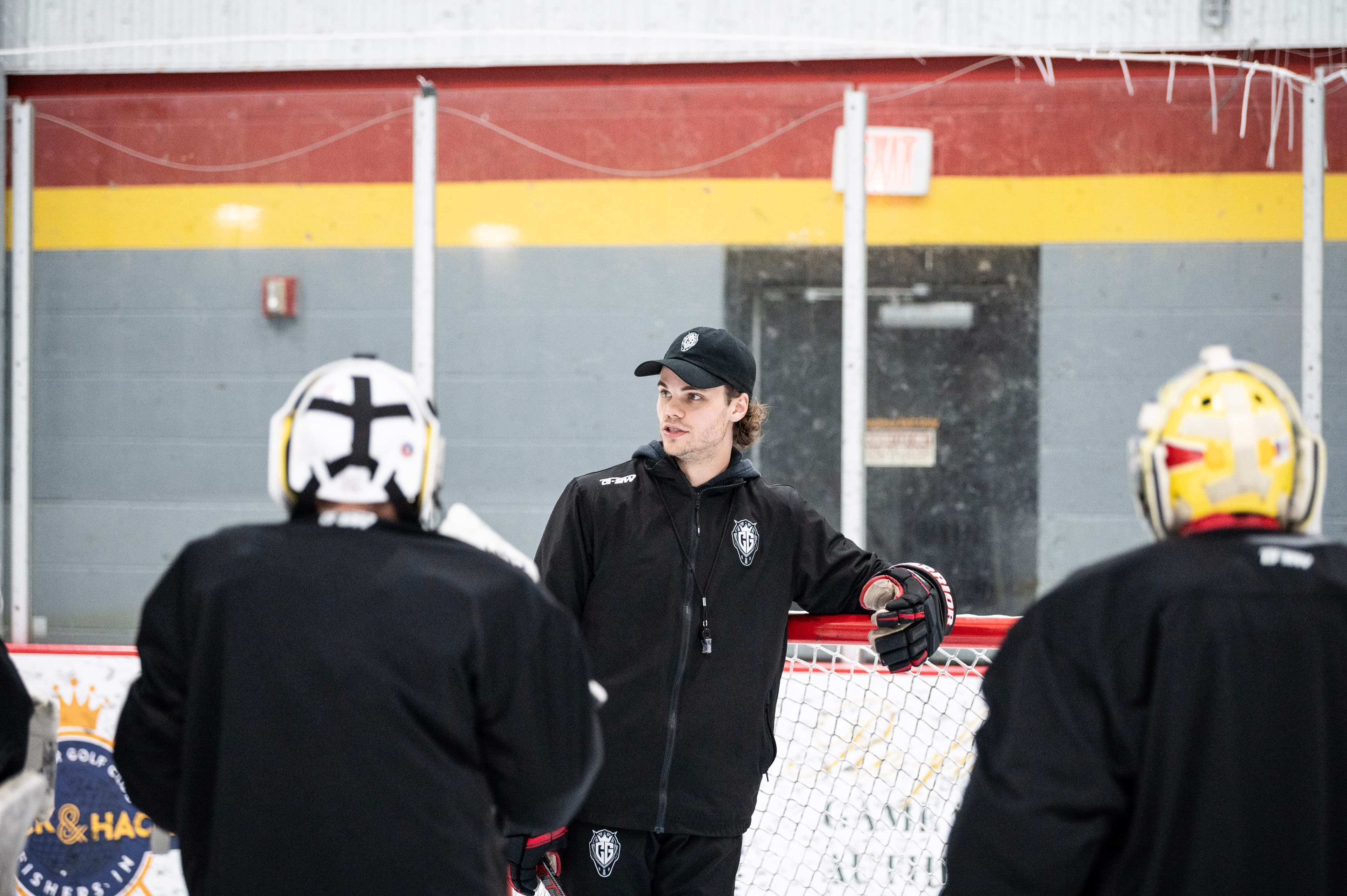 Cam coaching goalies at the net