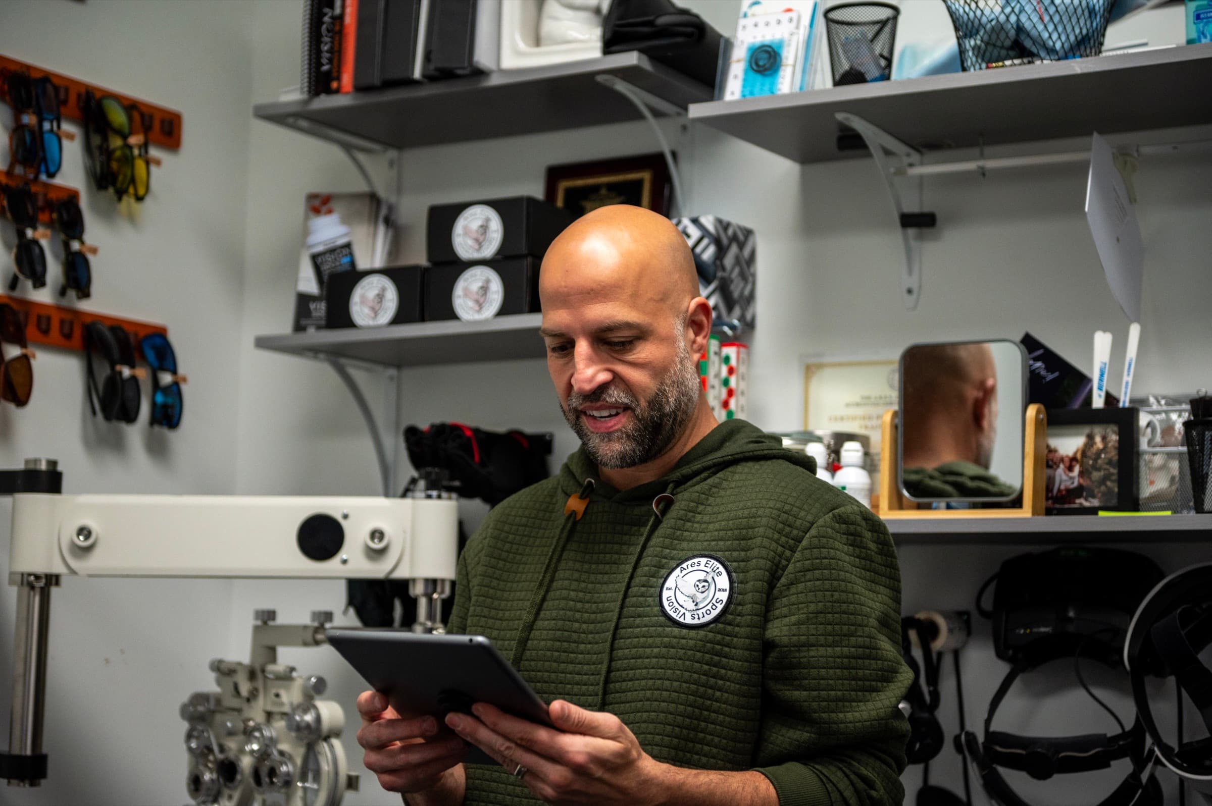 Dr. Joseph LaPlaca reviewing a goalie's visual-cognitive report