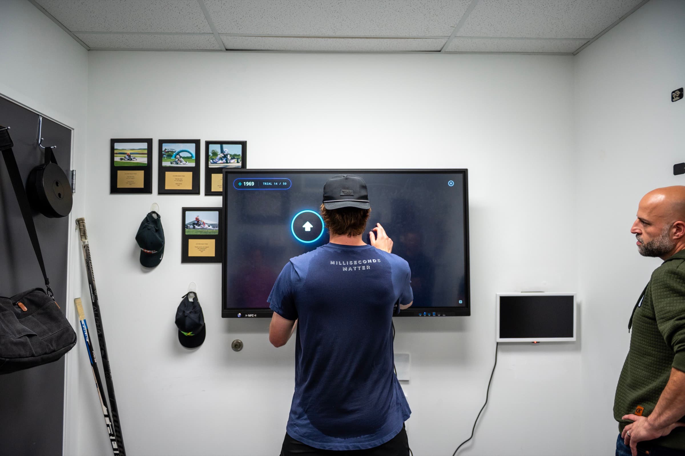 A goalie running a reaction drill on the AESV touchscreen