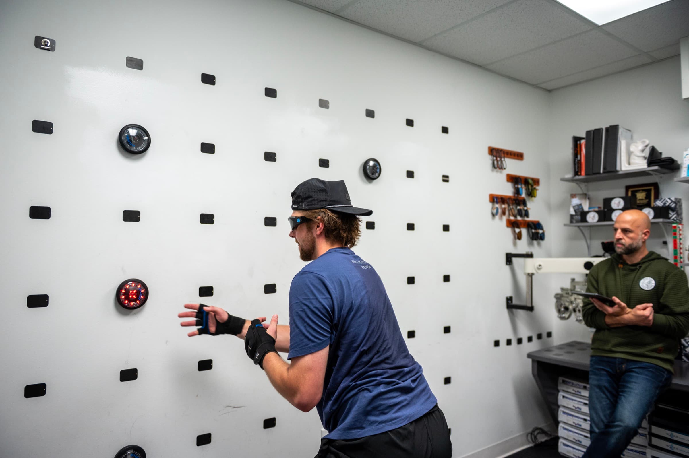 A goalie tracking and reacting to lit targets on the AESV reaction wall