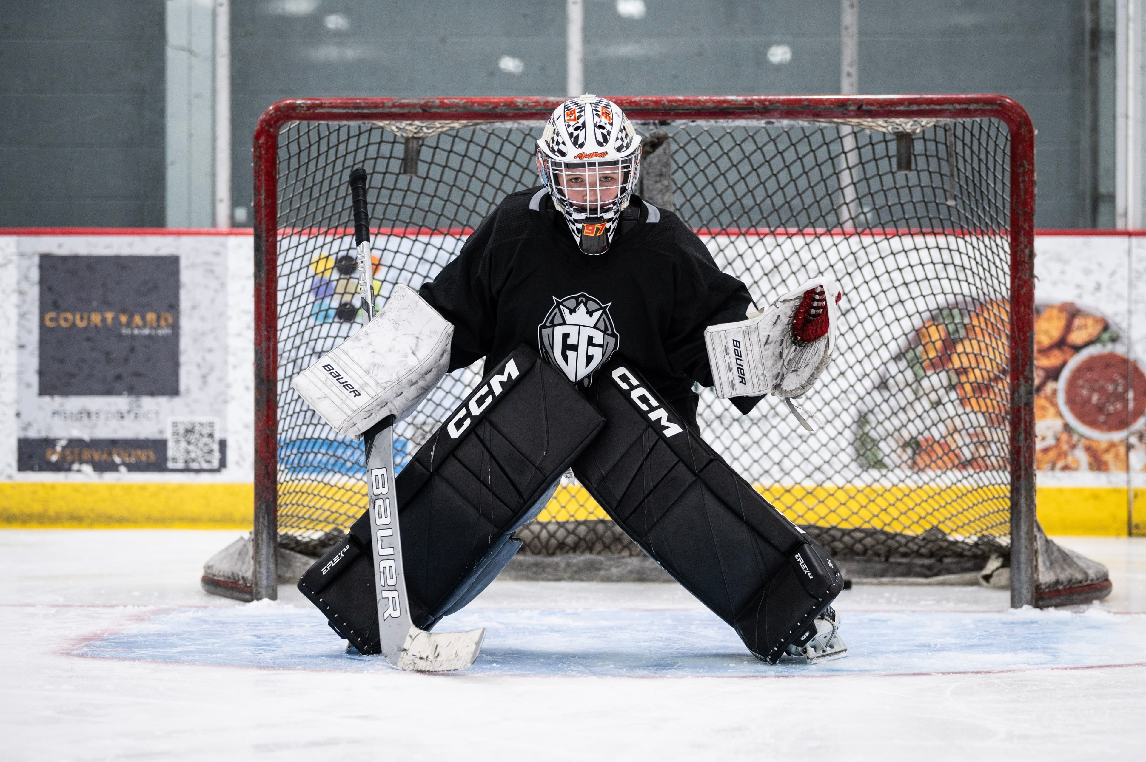 Young CGG goalie set in their net at camp